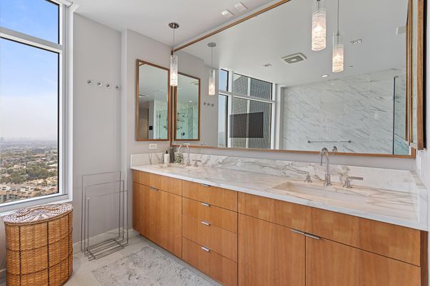 Bathroom, Dual Sink Vanities, Interior, Marble Walls, Pendant Lights, Recessed Lighting
