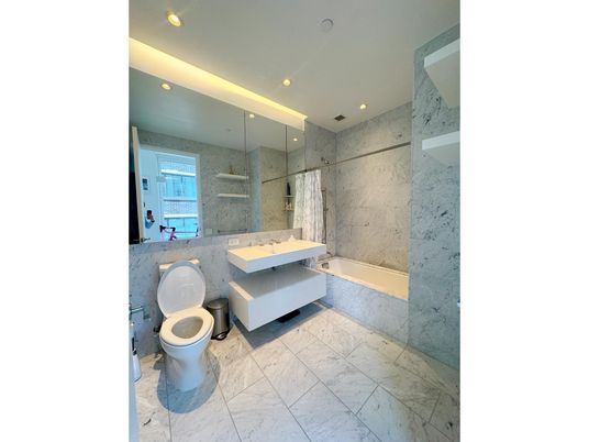 Bathroom, Free Standing Baths, Glass Shower, Interior, Marble, Marble Walls, Recessed Lighting