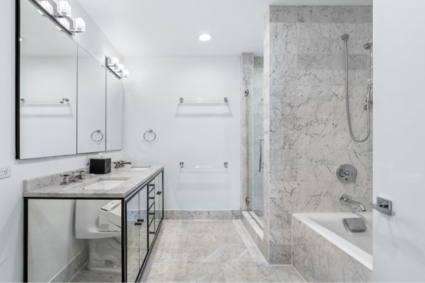 Bathroom, Dual Sink Vanities, Glass Shower, Interior, Marble, Marble Walls, Recessed Lighting
