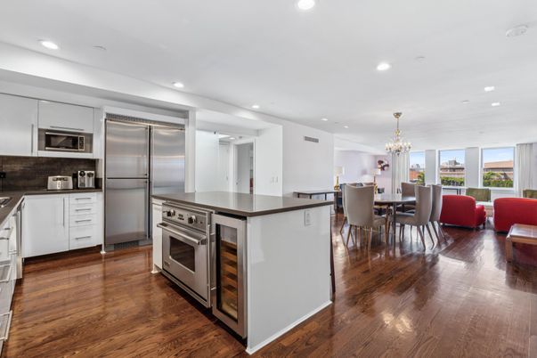 Chandelier, Dining room, Interior, Kitchen, Recessed Lighting, Stainless Steel Appliances, Wood Texture Flooring