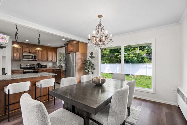 Chandelier, Dining room, Interior, Kitchen, Recessed Lighting, Stainless Steel Appliances, Wood Texture Flooring