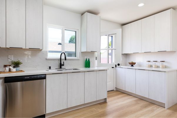 Interior, Kitchen, Marble Walls, Recessed Lighting, Stainless Steel Appliances, Wood Texture Flooring