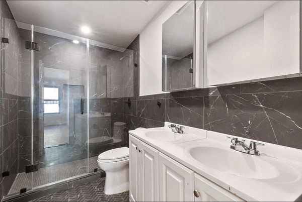 Bathroom, Dual Sink Vanities, Glass Shower, Interior, Marble Walls, Recessed Lighting