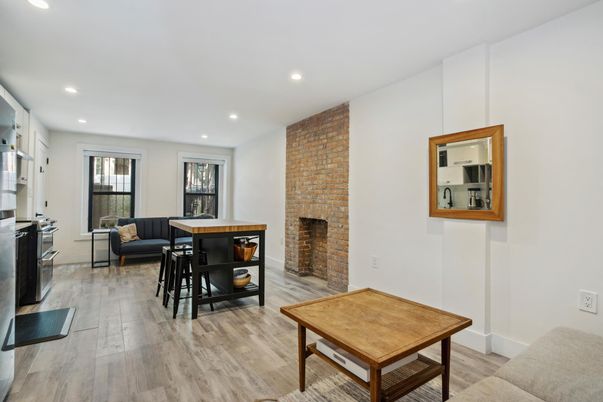 Fireplace, Interior, Recessed Lighting, Stone Walls, Wood Texture Flooring