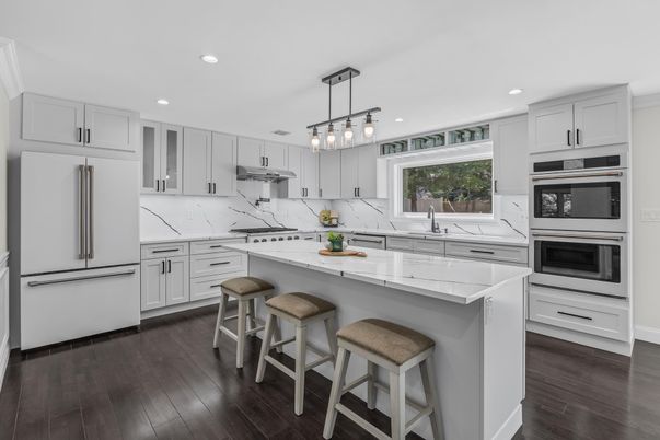 Interior, Kitchen, Marble Walls, Pendant Lights, Recessed Lighting, Stainless Steel Appliances, Wood Texture Flooring