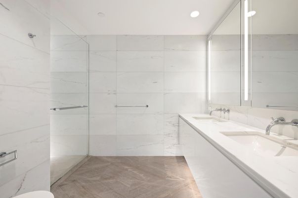 Bathroom, Dual Sink Vanities, Interior, Marble Walls, Recessed Lighting, Wood Texture Flooring