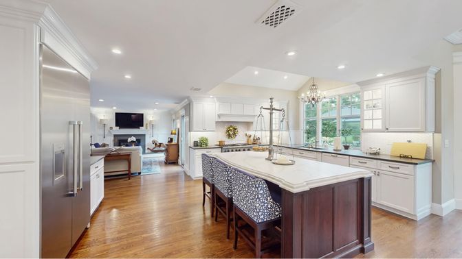 Chandelier, Fireplace, Interior, Kitchen, Living room, Recessed Lighting, Stainless Steel Appliances, Wood Texture Flooring