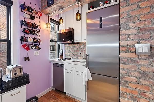 Interior, Kitchen, Pendant Lights, Stainless Steel Appliances, Stone Walls, Wood Texture Flooring