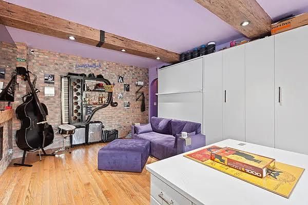 Fitness Equipment, Interior, Living room, Recessed Lighting, Stone Walls, Wooden Beams, Wood Texture Flooring