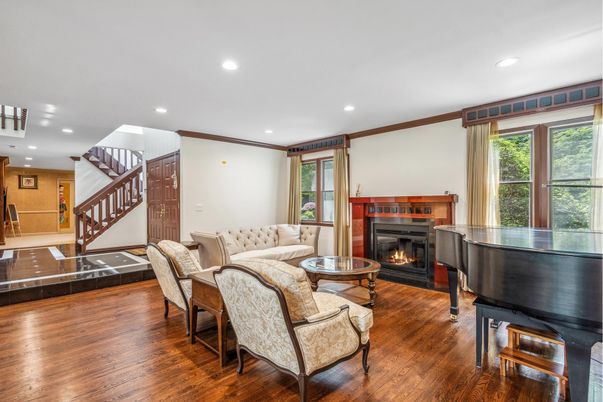 Fireplace, Interior, Living room, Piano, Recessed Lighting, Wood Texture Flooring