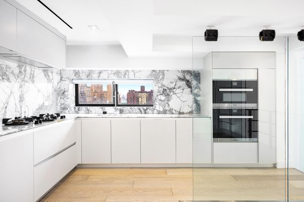 Interior, Kitchen, Marble Walls, Recessed Lighting, Stainless Steel Appliances, Wood Texture Flooring