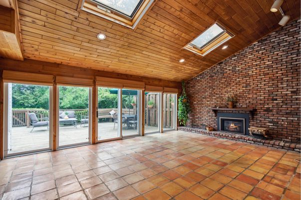 Empty room, Fireplace, Interior, Recessed Lighting, Stone Walls, Wooden Ceilings