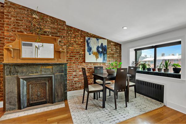 Dining room, Fireplace, Interior, Recessed Lighting, Stone Walls, Wood Texture Flooring