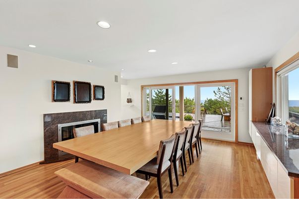 Dining room, Fireplace, Interior, Recessed Lighting, Water, Wood Texture Flooring
