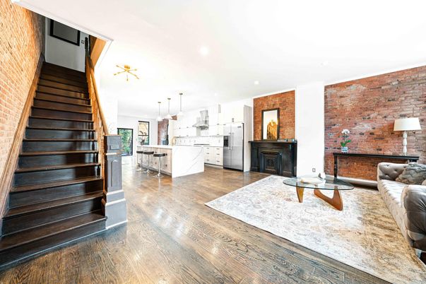 Fireplace, Interior, Kitchen, Living room, Pendant Lights, Recessed Lighting, Stainless Steel Appliances, Stone Walls, Wood Texture Flooring