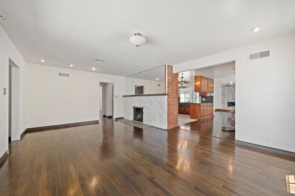 Empty room, Fireplace, Interior, Kitchen, Recessed Lighting, Wood Texture Flooring