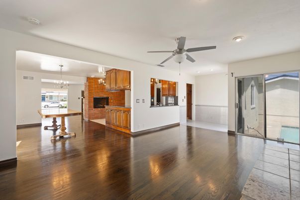 Chandelier, Dining room, Fireplace, Interior, Kitchen, Pendant Lights, Recessed Lighting, Stone Walls, Wood Texture Flooring