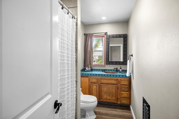 Bathroom, Interior, Recessed Lighting, Tile Countertops, Wood Texture Flooring