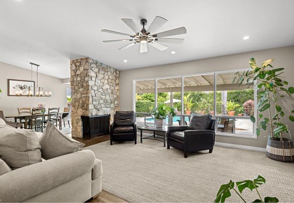 Chandelier, Dining room, Fireplace, Interior, Living room, Recessed Lighting, Stone Walls