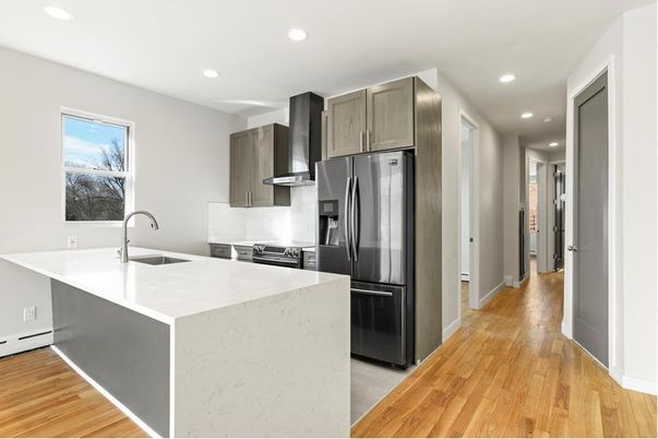Interior, Kitchen, Recessed Lighting, Stainless Steel Appliances, Wood Texture Flooring