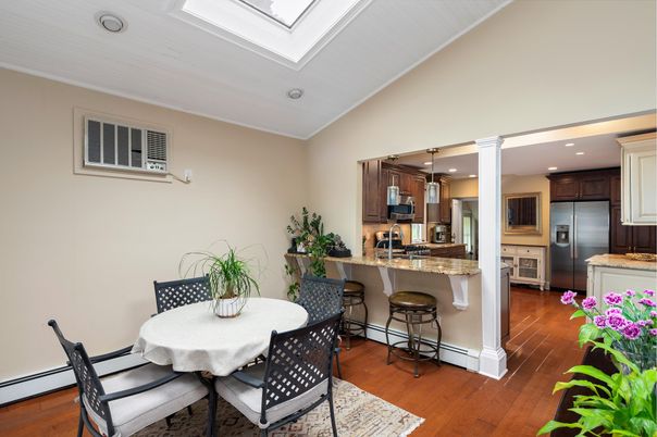 Dining room, Interior, Kitchen, Recessed Lighting, Stainless Steel Appliances, Wood Texture Flooring