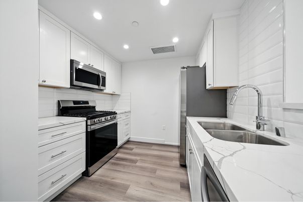 Interior, Kitchen, Recessed Lighting, Stainless Steel Appliances, Wood Texture Flooring