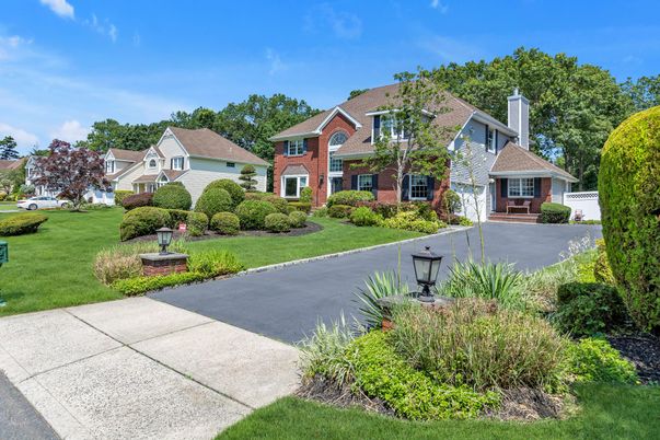 Attached, Backyard, Exterior, Facade, Brick Facade, Tudor Revival