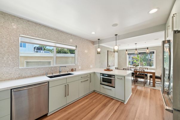 Dining room, Interior, Kitchen, Pendant Lights, Recessed Lighting, Stainless Steel Appliances, Wood Texture Flooring