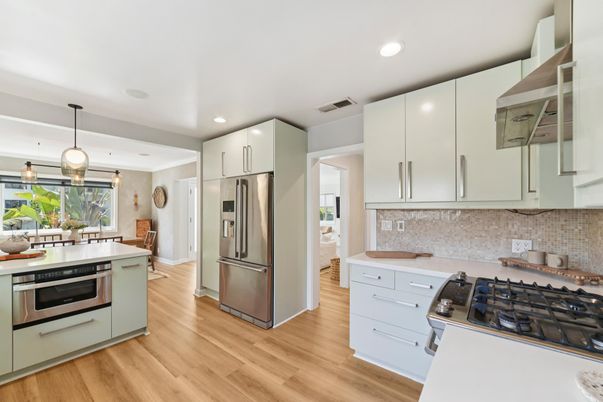 Dining room, Interior, Kitchen, Pendant Lights, Recessed Lighting, Stainless Steel Appliances, Wood Texture Flooring
