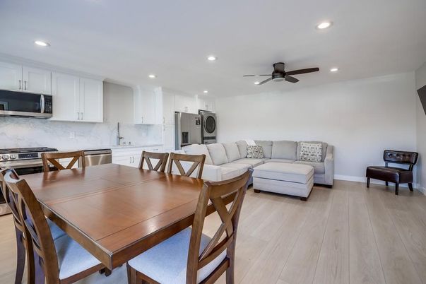 Dining room, Interior, Kitchen, Living room, Recessed Lighting, Stainless Steel Appliances, Wood Texture Flooring