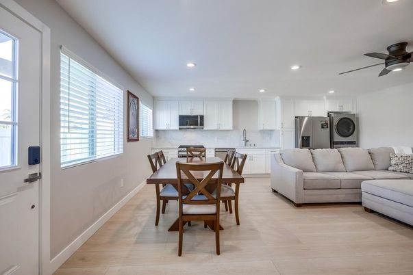 Dining room, Interior, Kitchen, Living room, Recessed Lighting, Stainless Steel Appliances, Wood Texture Flooring