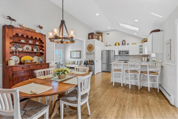 Dining room, Interior, Kitchen, Pendant Lights, Recessed Lighting, Stainless Steel Appliances, Wood Texture Flooring
