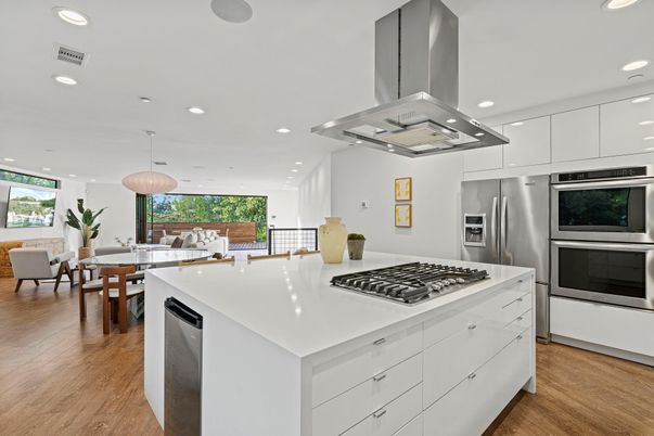 Dining room, Interior, Kitchen, Living room, Pendant Lights, Recessed Lighting, Stainless Steel Appliances, Wood Texture Flooring