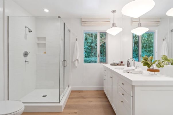 Bathroom, Dual Sink Vanities, Glass Shower, Interior, Pendant Lights, Recessed Lighting, Wood Texture Flooring