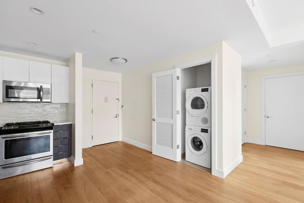 Interior, Kitchen, Recessed Lighting, Stainless Steel Appliances, Utility Closets, Washer, Wood Texture Flooring