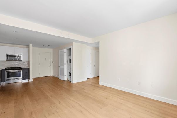 Empty room, Interior, Kitchen, Stainless Steel Appliances, Wood Texture Flooring
