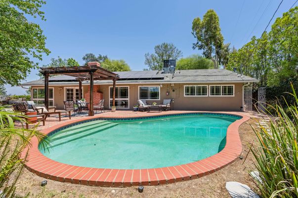 Exterior, Pool, Solar Panels