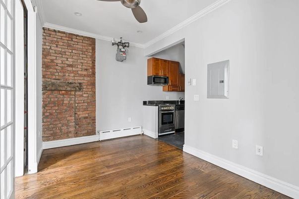 Empty room, Interior, Kitchen, Recessed Lighting, Stone Walls, Wood Texture Flooring