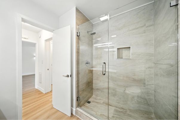 Bathroom, Glass Shower, Interior, Marble Walls, Wood Texture Flooring