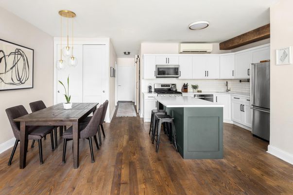 Dining room, Interior, Kitchen, Pendant Lights, Recessed Lighting, Stainless Steel Appliances, Wood Texture Flooring