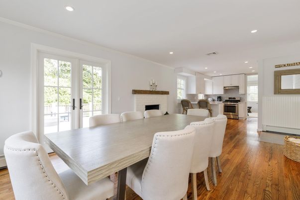 Dining room, Fireplace, Interior, Kitchen, Recessed Lighting, Stainless Steel Appliances, Wood Texture Flooring