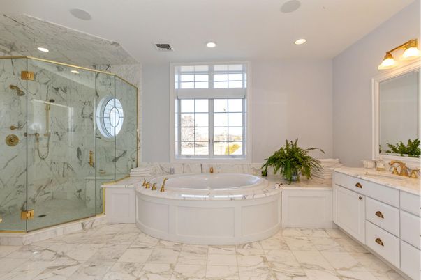 Bathroom, Dual Sink Vanities, Glass Shower, Interior, Marble, Marble Walls, Recessed Lighting