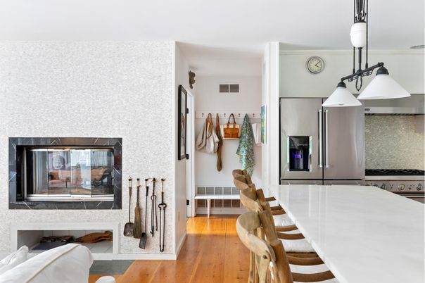Dining room, Fireplace, Interior, Kitchen, Pendant Lights, Stainless Steel Appliances, Wood Texture Flooring
