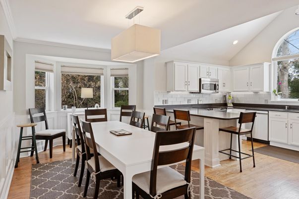 Dining room, Interior, Kitchen, Pendant Lights, Recessed Lighting, Stainless Steel Appliances, Wood Texture Flooring