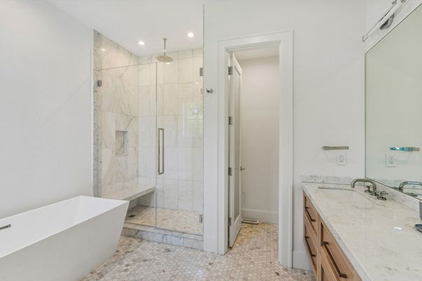 Bathroom, Dual Sink Vanities, Free Standing Baths, Glass Shower, Interior, Marble Walls, Recessed Lighting