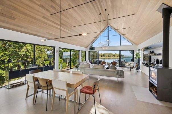 Dining room, Fireplace, Interior, Living room, Pendant Lights, Water, Wooden Ceilings, Wood Texture Flooring