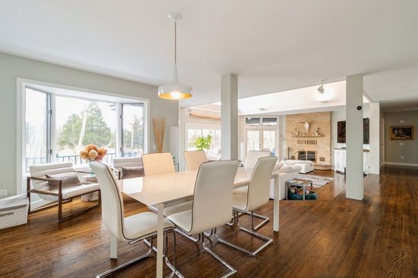 Dining room, Fireplace, Interior, Living room, Pendant Lights, Stone Walls, Wood Texture Flooring