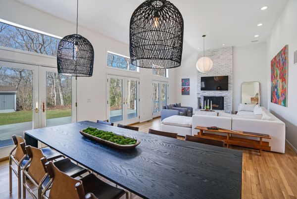 Dining room, Fireplace, Interior, Living room, Pendant Lights, Recessed Lighting, Wood Texture Flooring