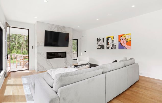Fireplace, Interior, Living room, Marble Walls, Recessed Lighting, Wood Texture Flooring