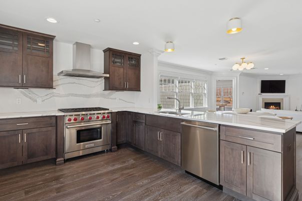 Fireplace, Interior, Kitchen, Recessed Lighting, Stainless Steel Appliances, Wood Texture Flooring